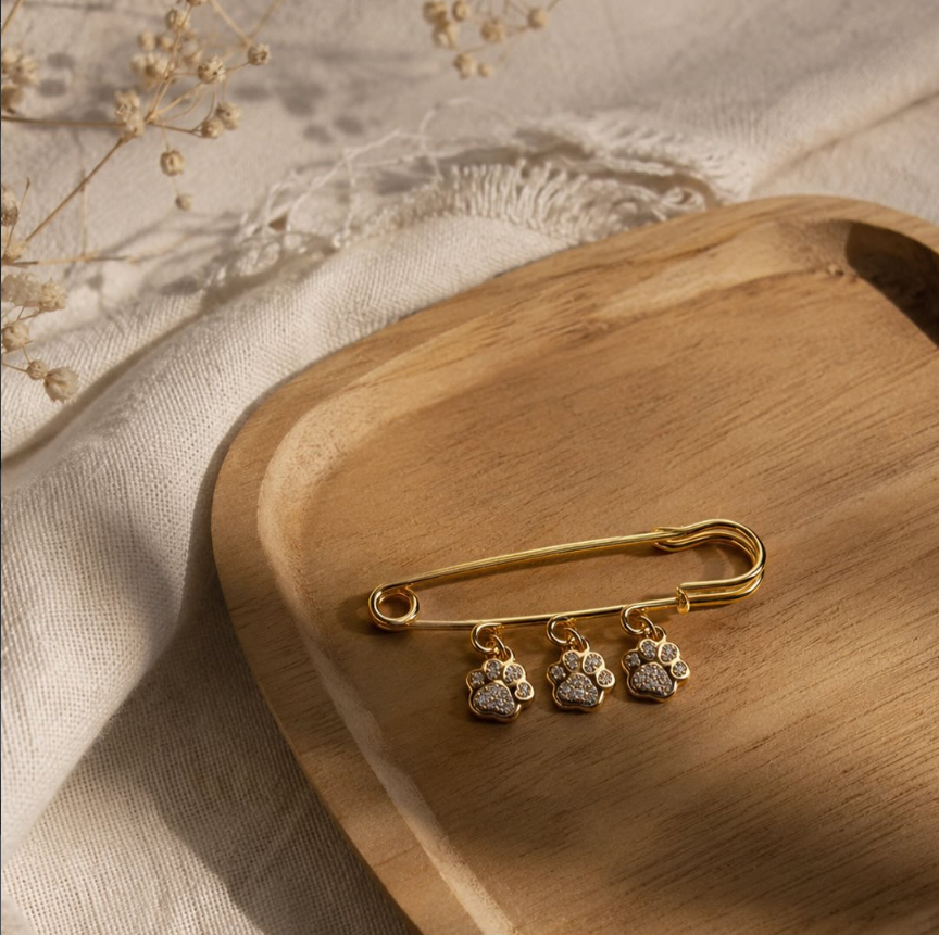 Imperdible Sömi dorado con tres huellas